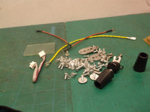 assorted parts from a KALORIK AFO 46045 SS MAXX Digital Air Fryer Oven