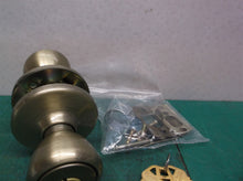 Kwikset Security Entry Knob Antique Brass. missing 2 screws