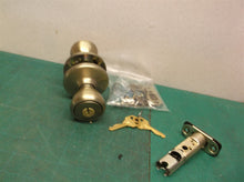 Kwikset Security Entry Knob Antique Brass. missing 2 screws