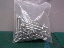 (25pcs) 2-1/4 x 3/16 nail type hex drive w nuts furniture assembly of some kind