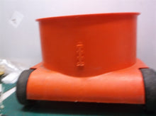 Red bucket with wheels from a henry vac nur200