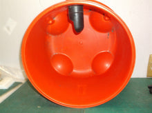 Red bucket with wheels from a henry vac nur200