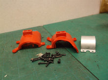 Assorted parts group off a Milwaukee 2475-20 M12 Compact Tire Inflator