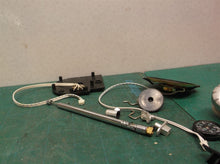 assorted parts off a Jeep tactical camping gear TV radio portable lantern JX1LTV