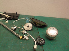 assorted parts off a Jeep tactical camping gear TV radio portable lantern JX1LTV