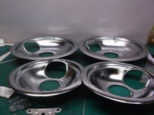 Set of 4 burner pans with large side hole