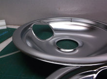 Set of 4 burner pans with large side hole