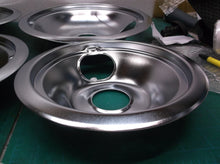 Set of 4 burner pans with small side hole