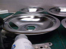 Set of 4 burner pans with small side hole