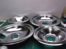 Set of 4 burner pans with small side hole
