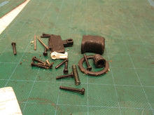 assorted parts off a PSBID01 18V Compact Brushless Impact Driver