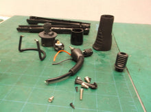 Assorted parts off a Plugged In Tourmaline Cone Curling Wand