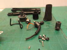 Assorted parts off a Plugged In Tourmaline Cone Curling Wand