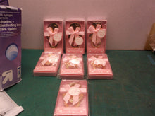 Lot of 7 pink baby shower bottle openers