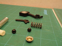Brake spring kit off a RYOBI RY3818 CHAINSAW