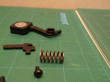 Brake spring kit off a RYOBI RY3818 CHAINSAW