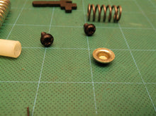 Brake spring kit off a RYOBI RY3818 CHAINSAW