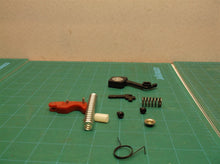 Brake spring kit off a RYOBI RY3818 CHAINSAW