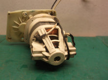 motor group from a Off A Homelite UT43104 Electric Chain Saw