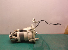 motor group from a Off A Homelite UT43104 Electric Chain Saw