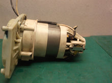 motor group from a Off A Homelite UT43104 Electric Chain Saw