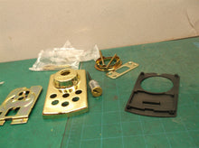 Assorted parts off a Kwikset 907 deadbolt