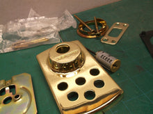 Assorted parts off a Kwikset 907 deadbolt