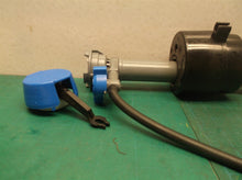 parts off a FLUIDMASTER Performax High Performance Fill Valve 400H-002