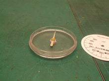 Assorted parts off a Watts 3/4 in. Plastic Water Pressure Test Gauge