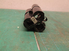 Battery holder off a Ryobi TVM01 12 Volt Rotary Tool