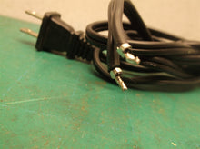 power cord off a Ryobi OP406VNM 40V Lithium-Ion Rapid Charger