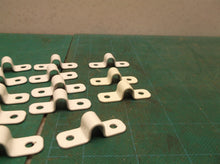 LOT OF 25 SADDLE CLAMPS NO HARDWARE
