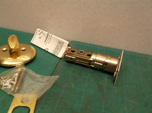 Kwikset deadlock by black & decker brass colored deadbolt with keys