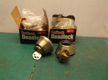 set of 3 Kwikset deadbolts keyed alike 2 complete & 1 for parts 2 sets of keys