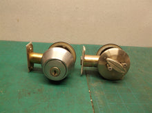 (2) Kwikset deadbolts no leys