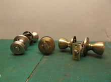 lot of exterior door knobs and deadbolt parts no keys
