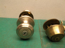 lot of exterior door knobs and deadbolt parts no keys