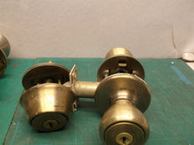 lot of exterior door knobs and deadbolt parts no keys