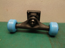 truck with wheels off a 31" hot wheels skateboard