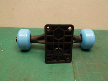 truck with wheels off a 31" hot wheels skateboard