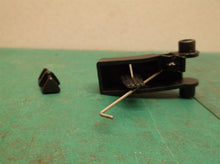 TRIGGER WTH SPRING & TRIGGER LOCK off a Ryobi RY124050VNM Brushless 4OV EZClea