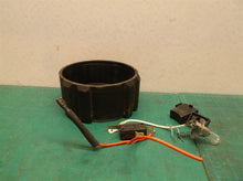 assorted parts off a western safety spot light