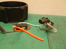 assorted parts off a western safety spot light