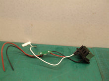battery connector off a EGO POWER+ ST1511T POWERLOAD 56-volt 15-in Cordless Stri