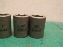 lot of 4 Dewalt 3\8 drive sockets 3/8 1/2 9/16 5/8