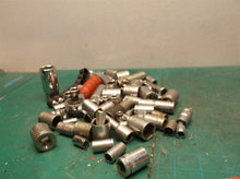 misc. Sockets off a 1/4 and 3/8ths bit set with ampro professional ratchet