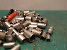 misc. Sockets off a 1/4 and 3/8ths bit set with ampro professional ratchet