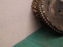 stack of 24 misc. circular saw blades 7 inch for crafts and misc.