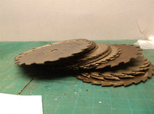 stack of 24 misc. circular saw blades 7 inch for crafts and misc.