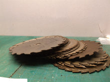 stack of 24 misc. circular saw blades 7 inch for crafts and misc.